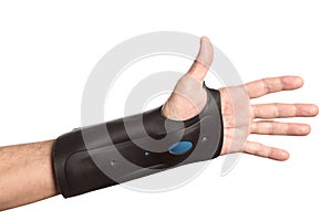 Human hand with a wrist brace, orthopedic equipment isolated on white background with clipping path and copy space for your text