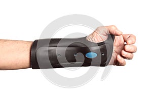 Human hand with a wrist brace, orthopedic equipment isolated on white background with clipping path and copy space for your text