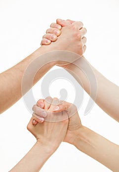Human hands demonstrating a gesture of a strife or solidarity