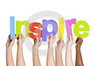 Human Hands Holding Word Inspire
