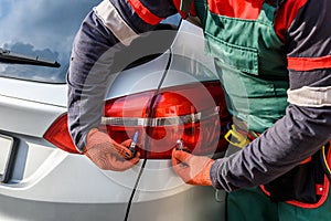 Human hands in protective gloves with headlamps