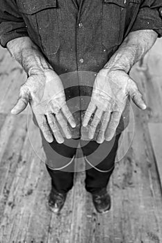 Human hands working on the production. Joiner, Cabinet-maker. 54 year old. Outdoor shooting