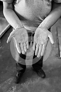 Human hands working on the production. Mechanic powertrain. 40 y