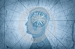 Human head and compass. The concept on the topic of navigation, photo