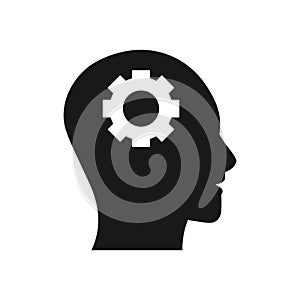 Human head silhouette with gear icon