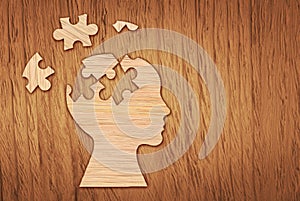 Human head silhouette, mental health symbol. Puzzle.