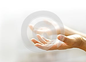 Human open empty hands with light background