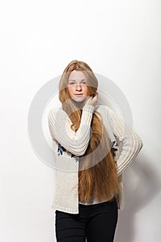 Human pose expressions and emotions. Portrait of young adorable redhead woman showing her gorgeous extra long natural red hair in