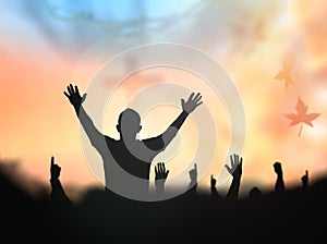 Human raising hands to praying God photo