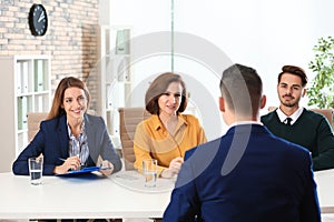 Human resources commission conducting job interview with applicant