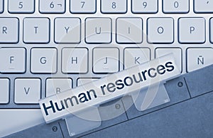 Human resources - Inscription on Blue Keyboard Key photo