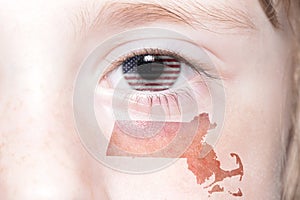 Human`s face with national flag of united states of america and massachusetts state map