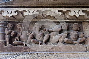 Human Sculptors depicting domestic life, at Vishvanatha Temple, Khajuraho, Madhya Pradesh, India - UNESCO world heritage site.