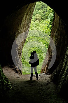 Human silhouette in the cave - Haiducilor Grotto, Baile Herculane, landmark attraction in Romania