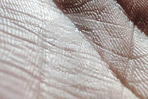 Human skin macro. The inside of a human hand. Dermatology concept, healthy skin texture background