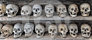 Human skulls inside a catacomb.