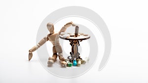 Human wooden dummy near table with medicines. Tips tackling complex medication regimen. Take medicines after food