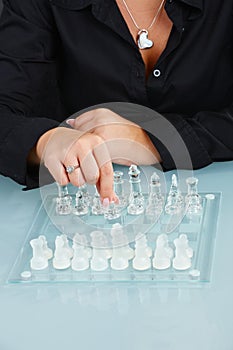 Humand hands playing chess