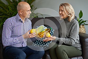 Humanitarian assistance to a pensioner from a social worker.Woman assisting elderly lady with her everyday routine.The