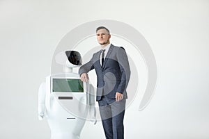 Humanoid autonomous robot with stylish man in a suit. Modern Robotic Technologies. Humanoid autonomous robot. white