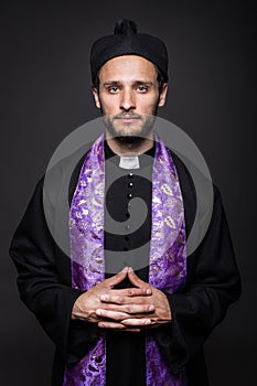Humble catholic priest photo