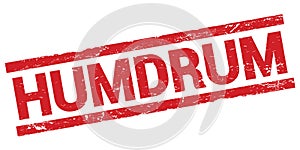 HUMDRUM text on red rectangle stamp sign