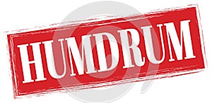 HUMDRUM text written on red stamp sign