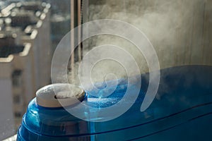 Humidifier producing a vapor