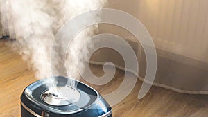 Humidifier spreading steam into the living room, normal relative humidity