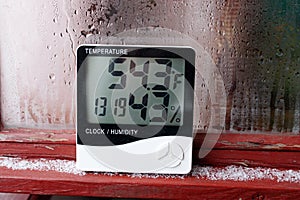 Humidity indicator is indicated on the hygrometer of the device. An image of electronic device to check temperature and humidity photo