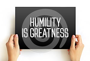 Humility Is Greatness text on card, concept background
