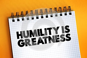 Humility Is Greatness text on notepad, concept background