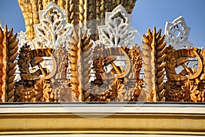 Hummers and Sickles Framed with Ears of Wheat - Ukraine Pavilion