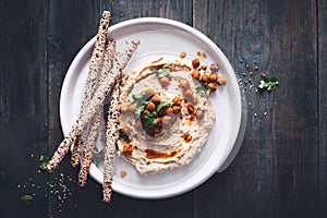 Hummus with crunchy Chickpeas and Bread stick for Starter.