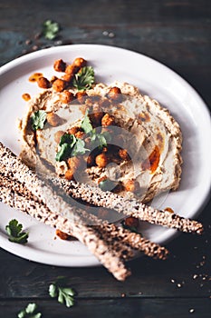 Hummus with crunchy Chickpeas and Bread stick for Starter.