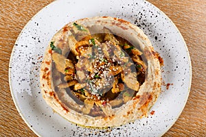 Hummus is a dip, spread, or savory dish made from cooked, mashed chickpeas