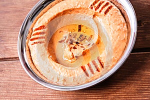 Hummus Har served in dish isolated on background top of arabic food cold mezza photo