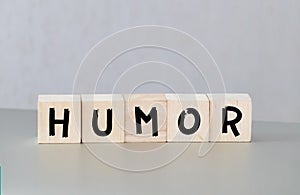 humor word written on wood block