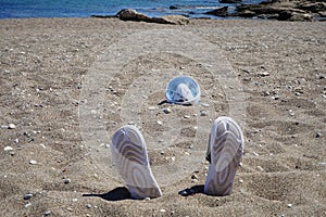 A humorous decorative composition on a sandy beach. Kolimpia, Rhodes, Greece