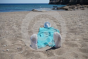 A humorous decorative composition on a sandy beach. Kolimpia, Rhodes, Greece