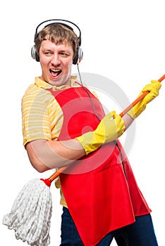 Humorous photo male housewife with a mop