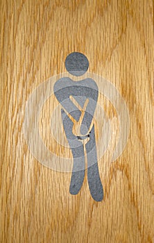 Humorous public toilet sign indicating toilet facilities