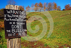 A humorous sign warns potential tresspassers to stay off the property