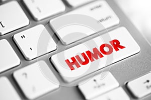 Humour - the quality of being amusing or comic, especially as expressed in literature or speech, text concept button on keyboard