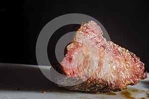 hump steak on a white board with copy space