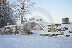 Humpback bridge in the January twilight. Gatchina, Leningrad region