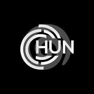 HUN letter logo design on black background. HUN creative initials letter logo concept. HUN letter design photo
