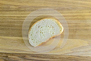 Hunch white bread on wooden board photo