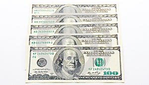 Hundert dollars banknotes on white background