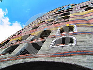 Hundertwasser House in Darmstadt, Germany with blue sky